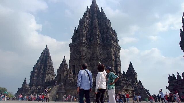 Timelapse of the UNESCO Prambanan Temple with a lot of visitors during the day. World beautiful Hindu temple in Asia.