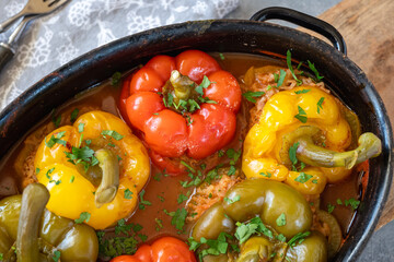 Pepper stuffed with minced meat and rice in tomato sauce.