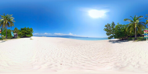 Aerial view: Island with a sandy beach and azure water surrounded by a coral reef. 360 VR....