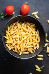 pasta penne durum wheat trend meal snack copy space food background rustic. top view