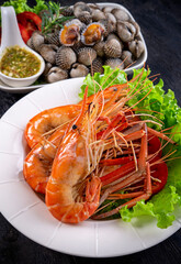 Seafood grilled on white plate