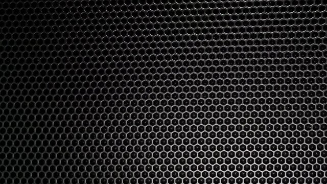 Background from metal rhombuses on black and chrome metal