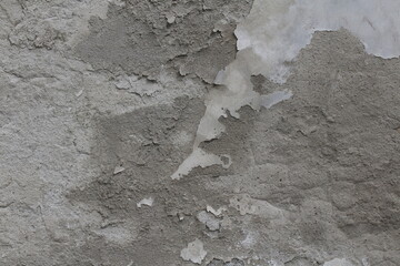 parete di mattoni rossi e intonaco rovinati