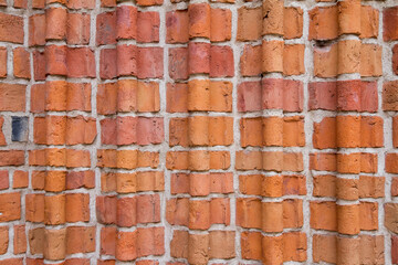 Background: Brick wall in close up	
