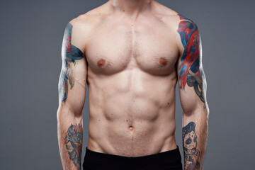 pumped up nude torso men tattoos close-up exercise