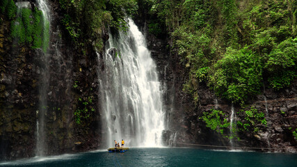 Waterfall in the jungle of the Philippines. Tinago Falls in the tropical forest. Iligan City, Lanao del Norte.