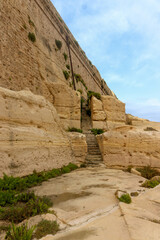 Malta sandstone rock wall castle with stairs