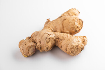 Close view on a ginger root on white background