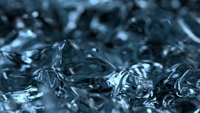 Super Slow Motion Abstract Shot of Waving Blue Clear Liquid Background at 1000fps.