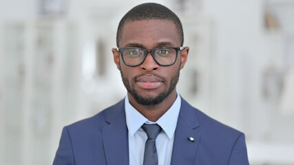 Portrait of Serious African Businessman Looking at the Camera