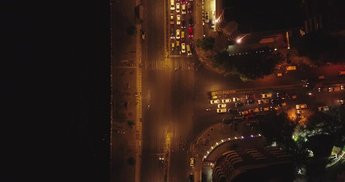 An aerial view with cinematic drone movement of the iconic Marine Drive nightlife with Air India and Trident Hotel buildings in sight.