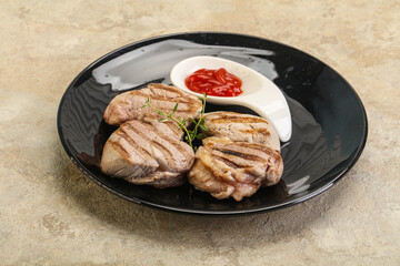 Grilled pork tenderlion with tomato sauce