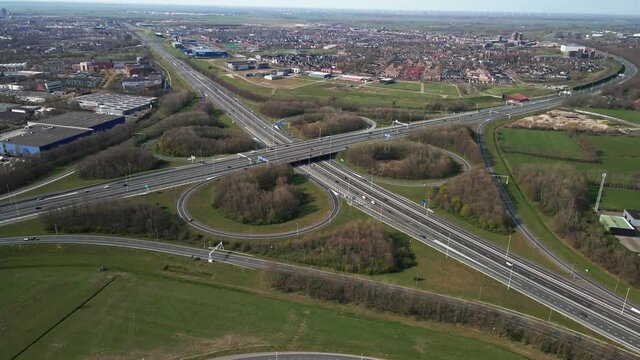 Knooppunt Hoevelaken in the shape of a clover aerial drone view. Intersection of the A28 and A1 highway The Netherlands.