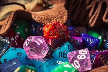 Close-up of a d20 on a pile of dice