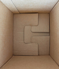 Inside view of empty brown cardboard box.