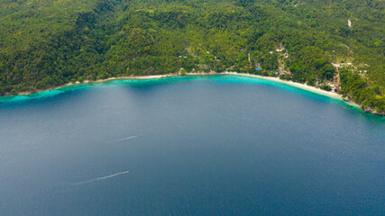 Tropical sandy beach and clear turquoise water. Canibad beach, Island Garden City of Samal, Davao.