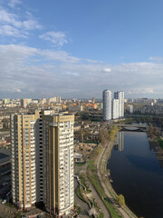 Fototapeta premium Residential area Rusanovka in Kiev in sunny day. Spring on Rusanivka canal, new buildings, Kyiv , Ukraine. High quality photo
