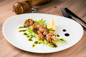 Mixed seafood salad with shrimps on the table