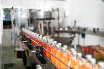 Production line for drinking water, fruit juice and liquid medicine in the factory. Sterilized and sterilized bottle filling machines