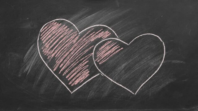 Two hearts drawn in chalk