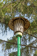 Top of the old outdoor lighting lantern close-up