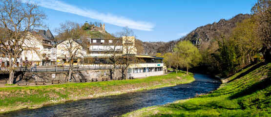 Cityscape of Altenahr with river shore and view to the ruin of castel Are - Stadtansicht von Altenahr mit Blick auf das die Burg Are