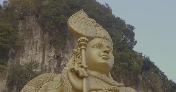 Gold Statue of Kartikeya in Batu Caves. Skanda, Kumara, Murugan. Hindu God of War