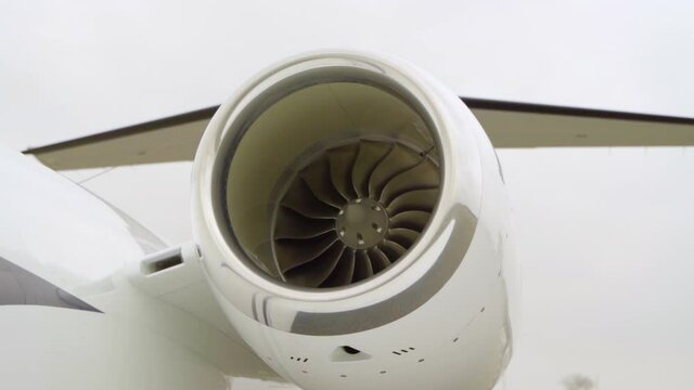 Medium shot of Jet Engine On A Small Private Jet named Cessna Citation during daytime.