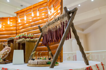 Traditional Hunting Sausages on the table. Family gathering for food preservation, pork meat and venison from a local hunter.