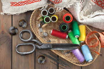 Threads, needles and sewing items.
