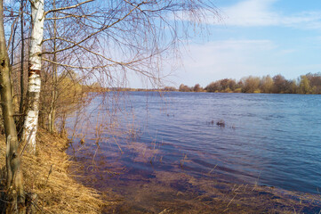 Spring landscape with a river in the countryside