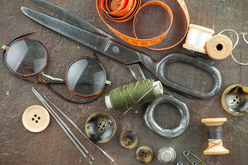 Threads, needles and sewing items.