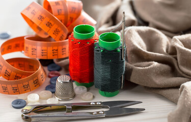 Threads, needles and sewing items.