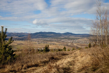 Idyllic rural view of gently rolling patchwork farmland and villages with pretty wooded boundaries, in the beautiful surroundings