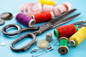 Threads, needles and sewing items.
