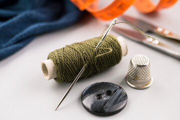 Threads, needles and sewing items.