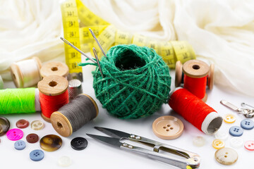 Threads, needles and sewing items.