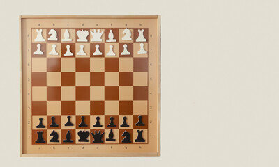 A chessboard hangs on the wall. Magnetic chess pieces stand in their places before the start of the game. The King's pawn went e2-e4. The concept of the beginning of the battle