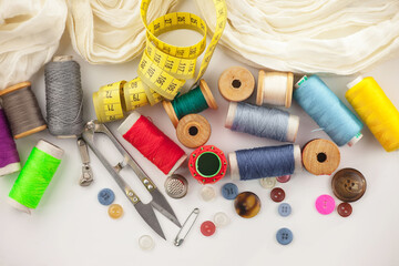 Threads, needles and sewing items.