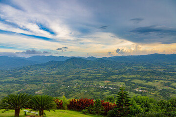 View from a large mountain to a valley with a lake in the Dominican Republic