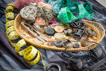 Threads, needles and sewing items.