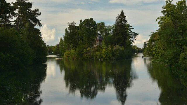 Time lapse of people rowing boat on a lake in summer