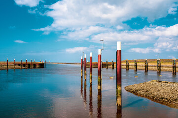Coastal protection structure, lock and barrage Leysiel near Greetsiel, Germany.