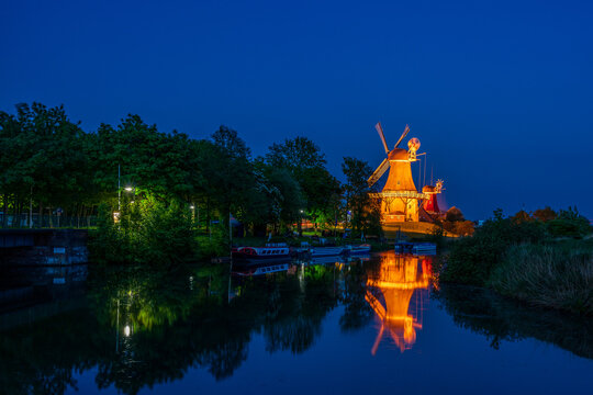Old historical windmill in Greetsiel, Germany.