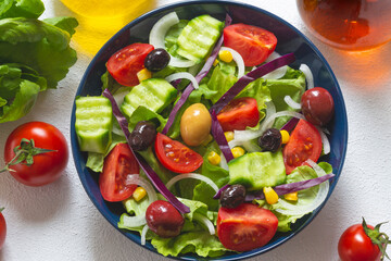 Mediterranean salad. It contains plenty of olive oil and vinegar water. It's a great salad for dieters. A widely consumed salad for a healthy diet.