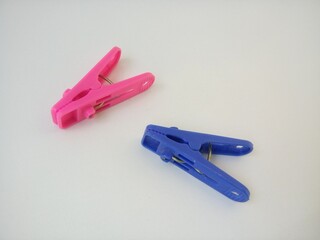 clothes pegs on a white background