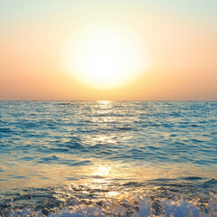 Fototapeta na wymiar Sunset above sea