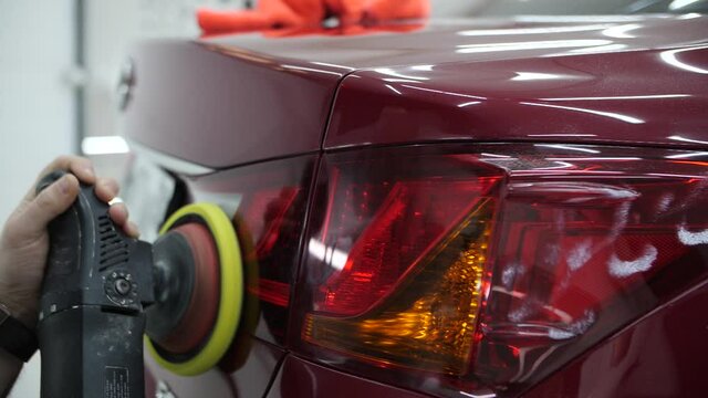 footage of car body polishing detailing