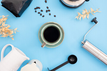 coffee cup and moka pot on black table backgroun, coffee shop.