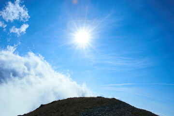 Sun on blue sky with clouds and Earth. Nature ecology landscape